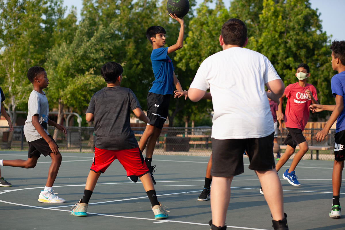 youth AAU basketball players during tryouts